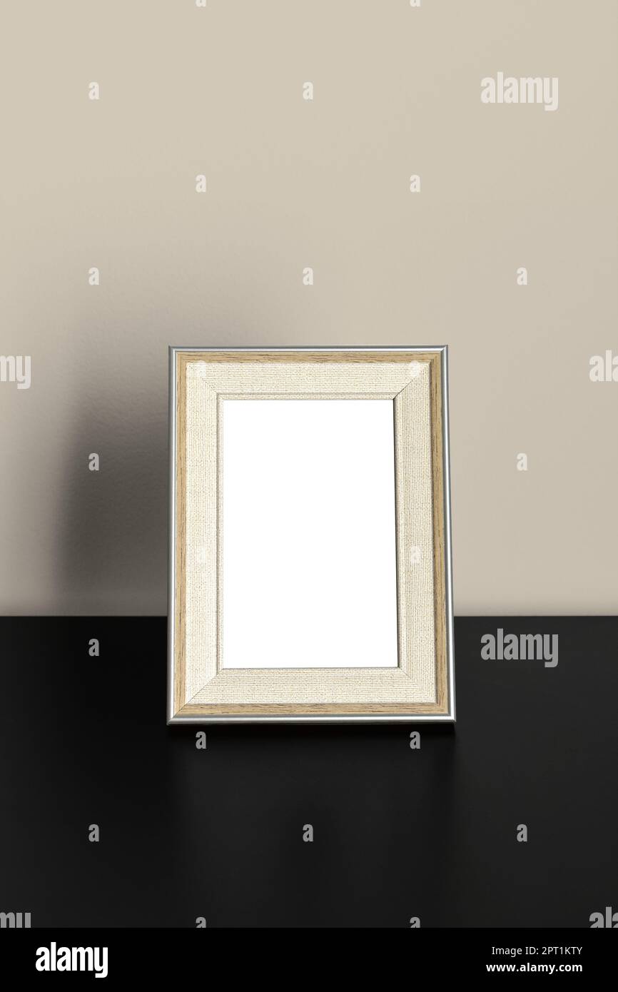 Telaio verticale Mockup in piedi su un tavolo di legno all'interno della sala d'ufficio su sfondo marrone chiaro parete Foto Stock