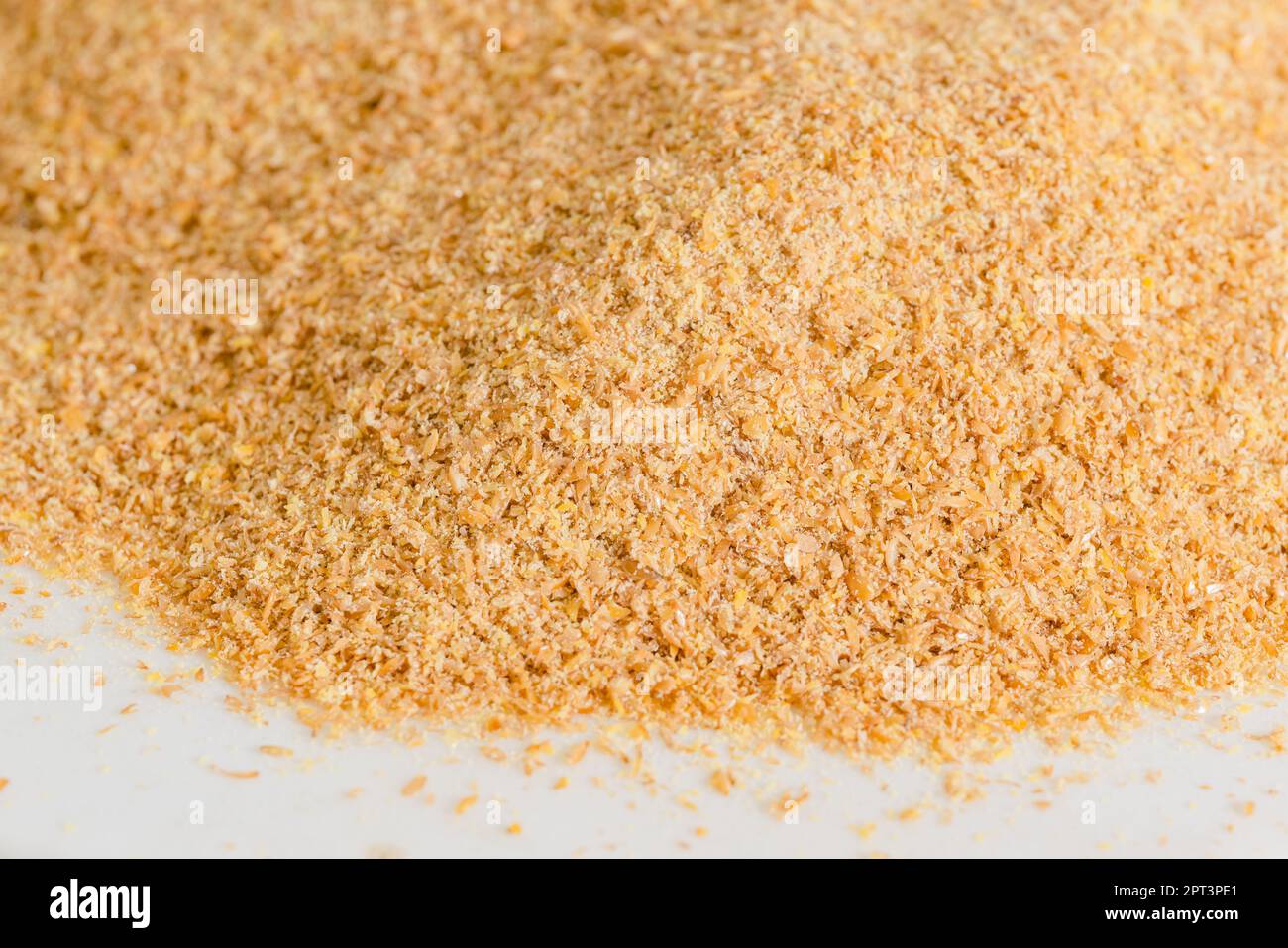 Primo piano del pasto biologico di semi di lino dorato, sfondo alimentare Foto Stock