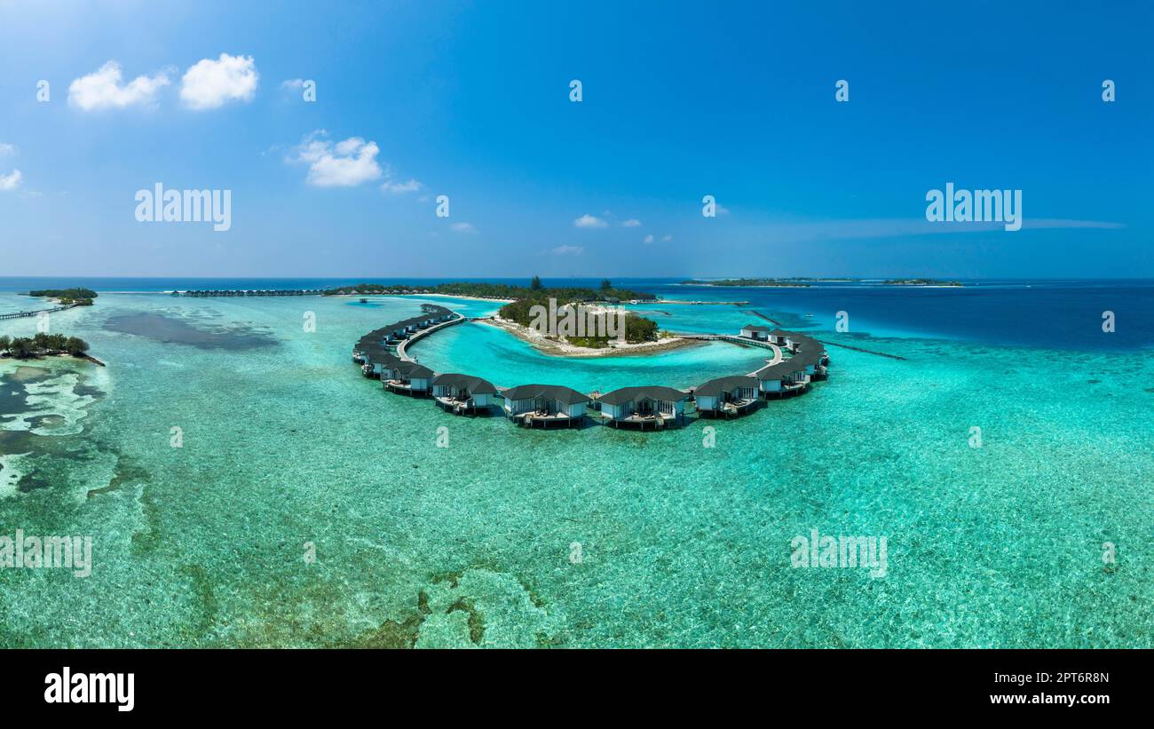 Vista aerea, Kanuhuraa, cannella Dhonveli Maldive, con spiagge e bungalow acqua, North Male Atoll, Oceano Indiano, Maldive Foto Stock