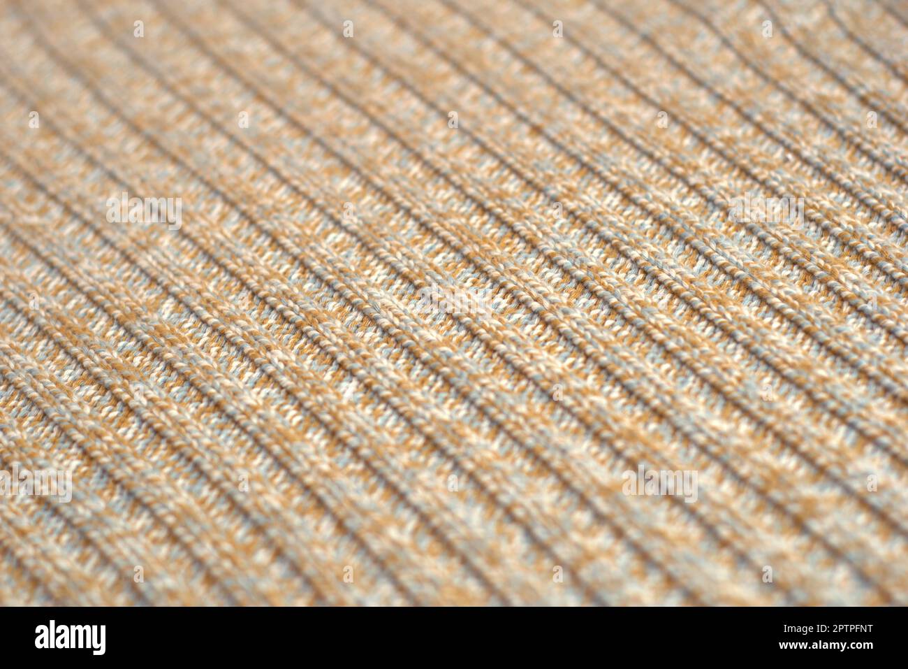 Chiazzato beige maglia maglione di lana. Texture Detail close up. Foto Stock