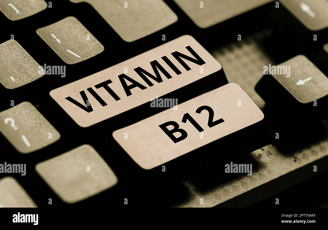 Segno di testo che mostra la vitamina B12, vetrina aziendale Gruppo di sostanze essenziali per il funzionamento di alcuni enzimi Foto Stock