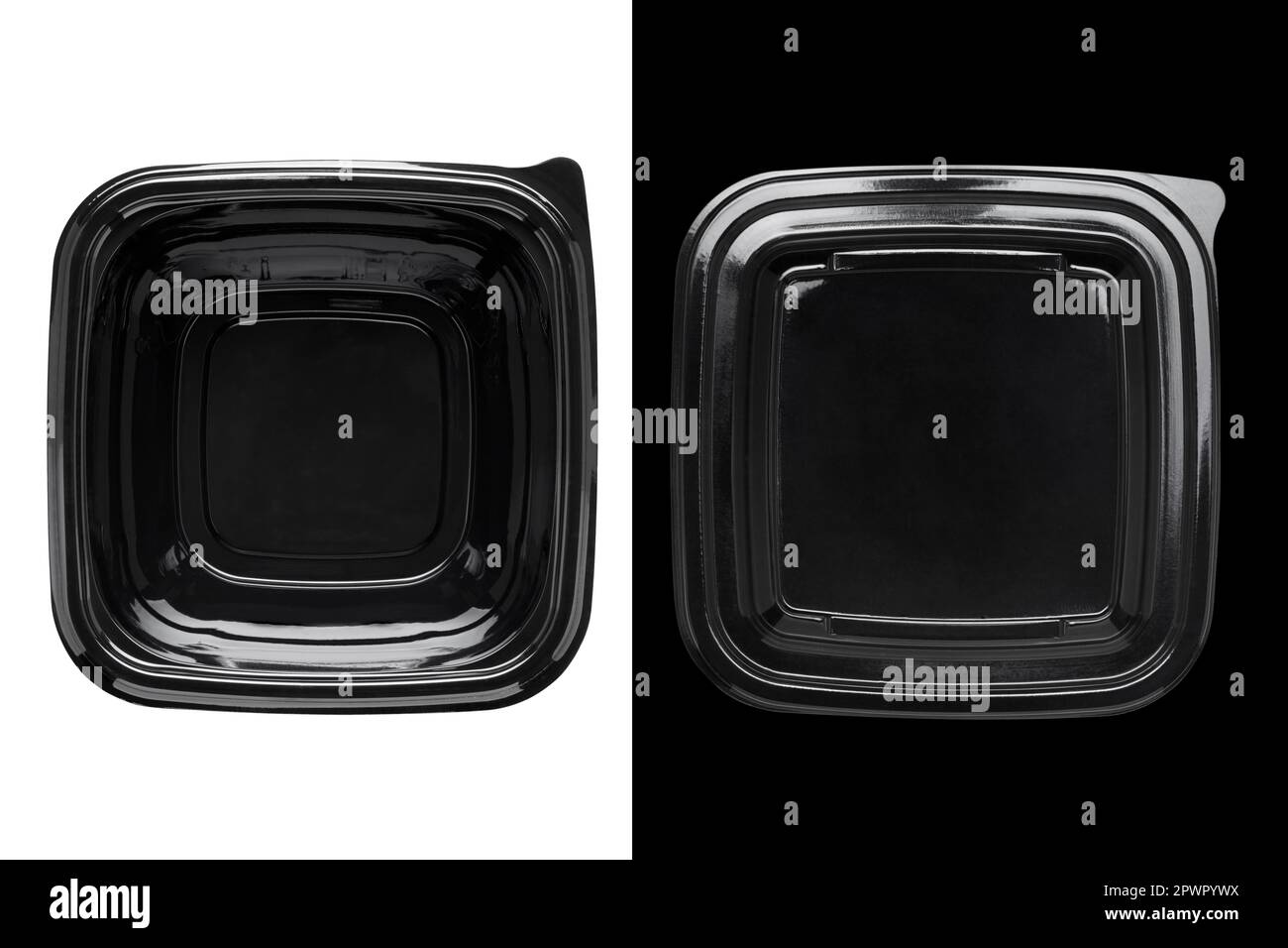 Contenitore per alimenti in plastica nera con coperchio trasparente su sfondo bianco e nero. Vista dall'alto. Foto Stock