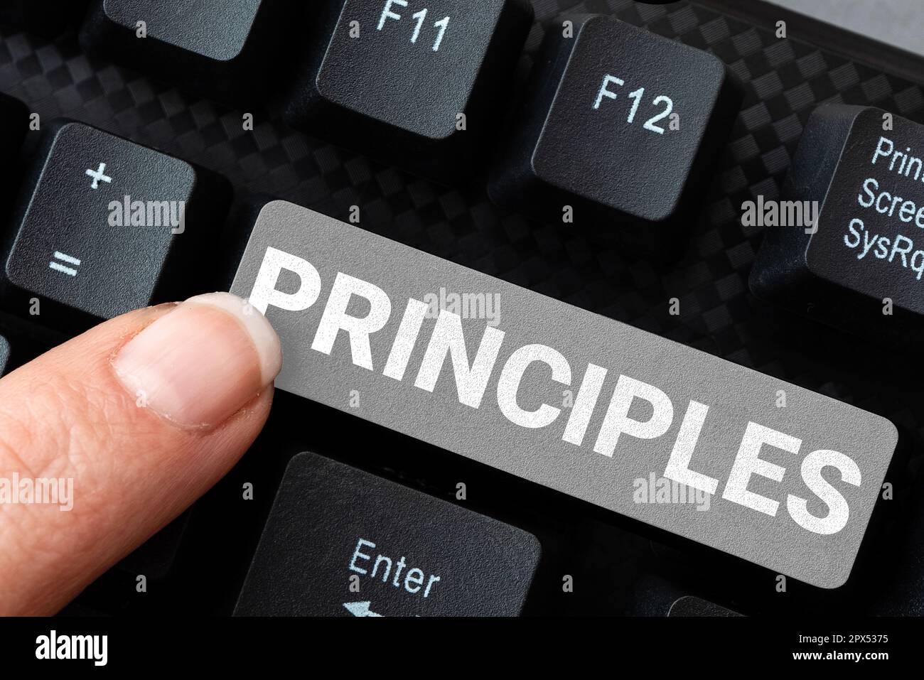 I principi di segno di scrittura della mano, concetto che significa la verità fondamentale che serve come base per un sistema di credenza Foto Stock