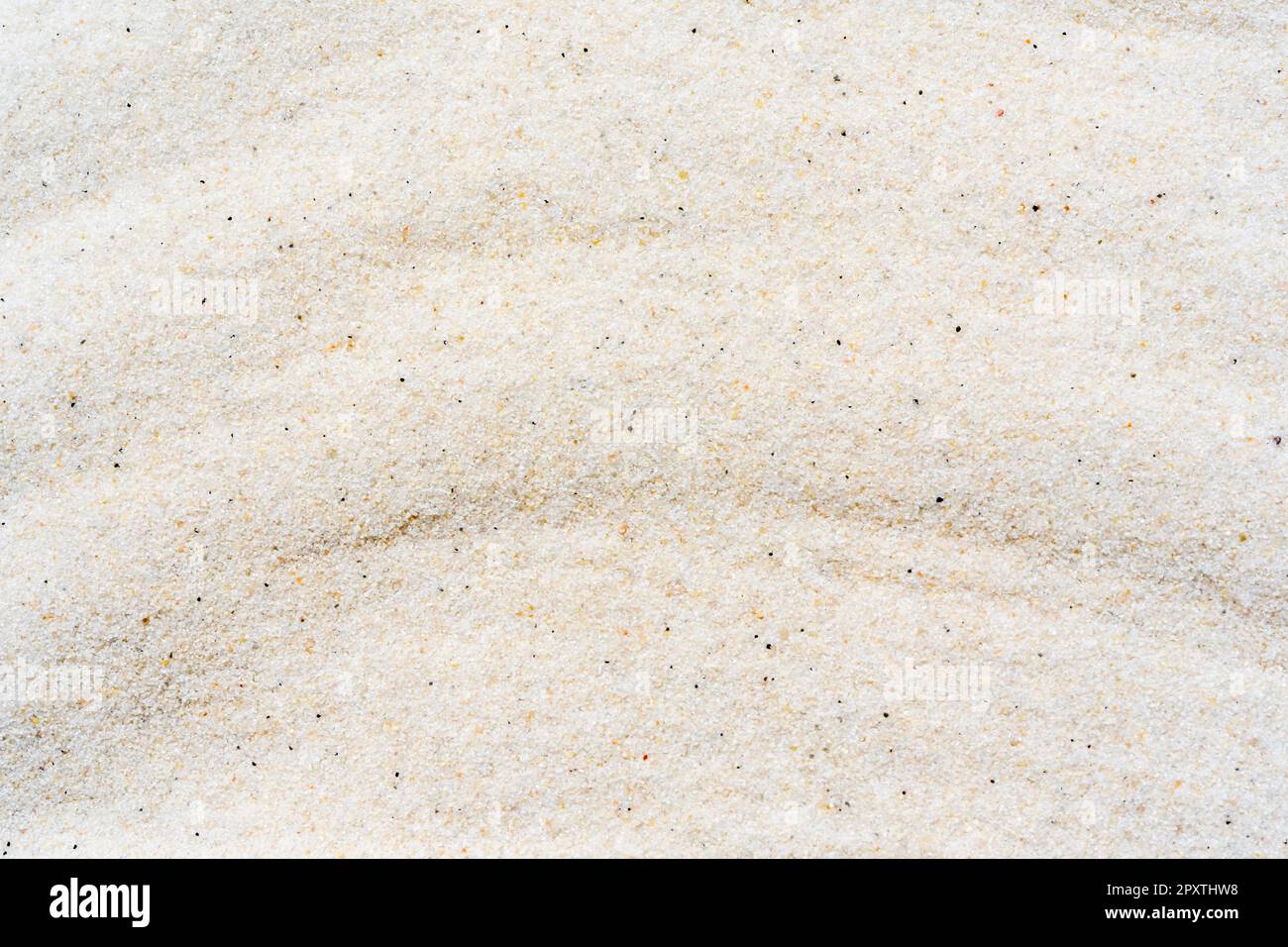 Sfondo di sabbia bianca, macro primo piano di sabbia bianca o astratto tessuto di onde di sabbia bianca. Foto di alta qualità Foto Stock