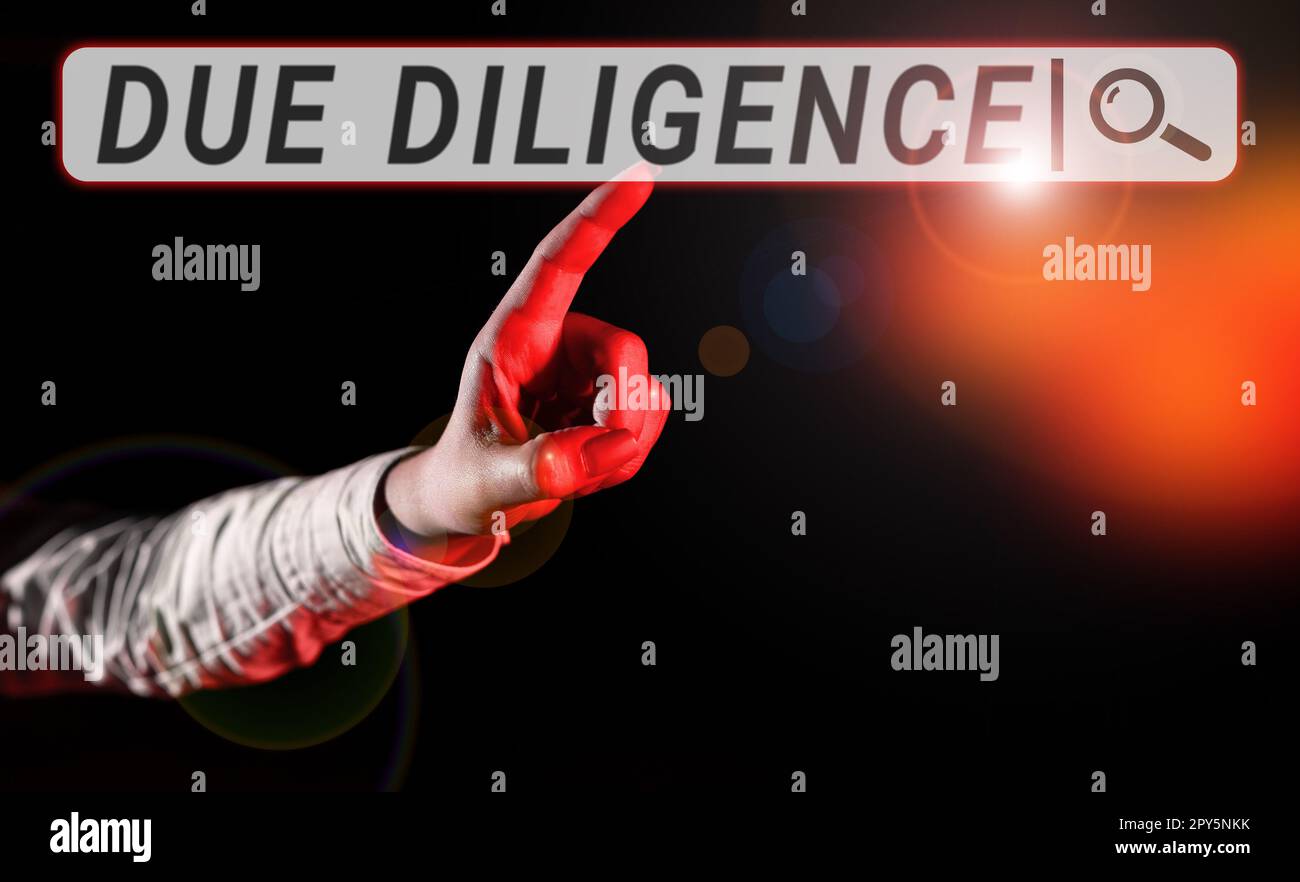 Scrittura a mano del testo dovuta diligenza. Parola per evitare di danneggiare altri beni aziendali per un accordo Foto Stock