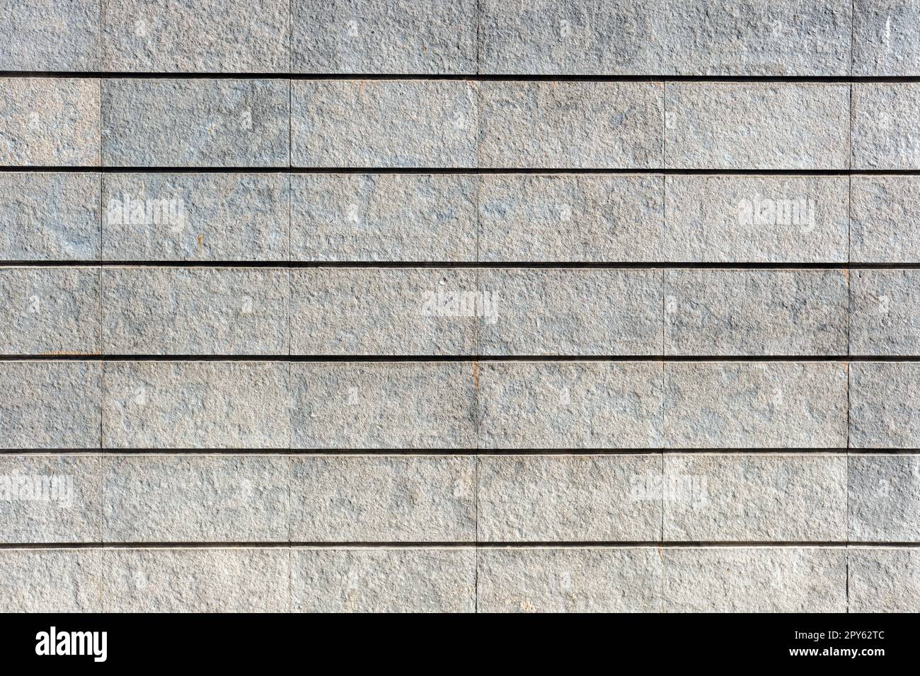 Sfondo da un muro di granito grigio Foto Stock