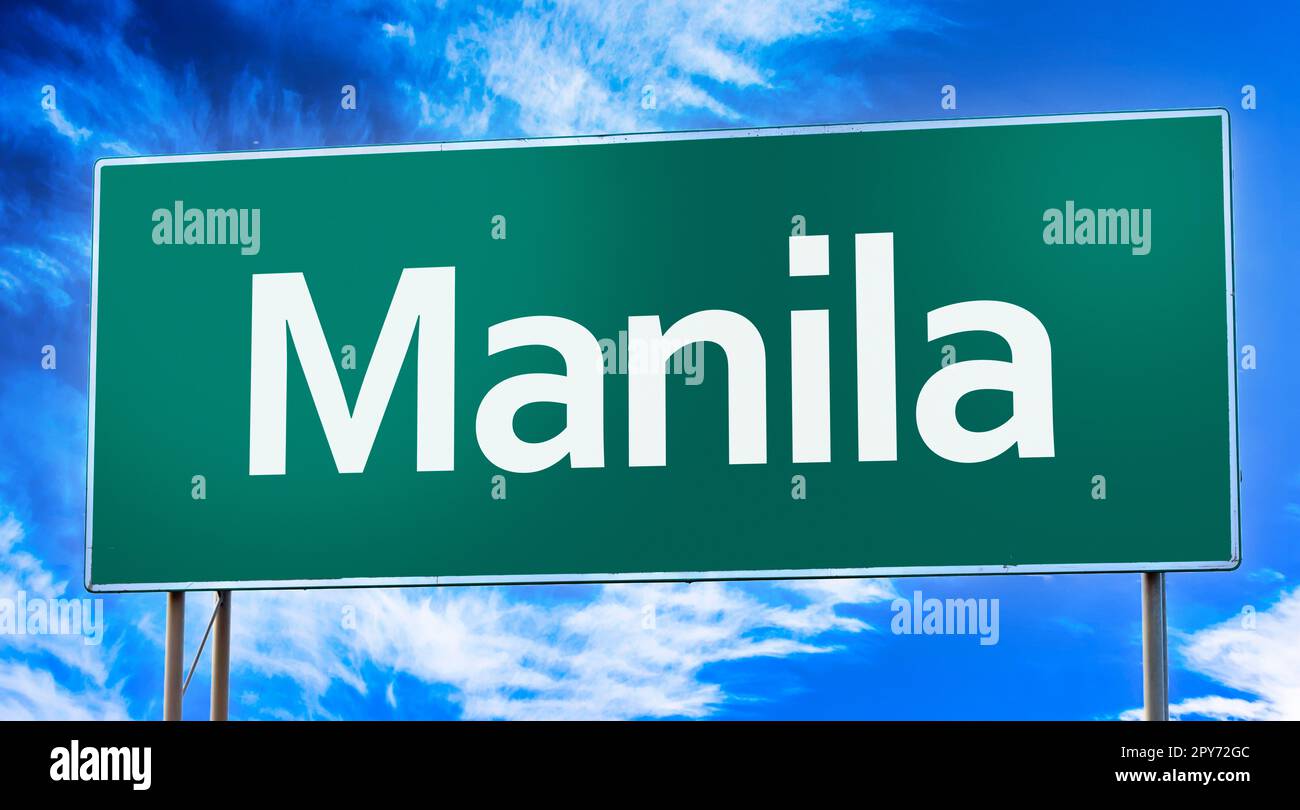 Cartello stradale che informa dell'ingresso alla città di Manila Foto Stock