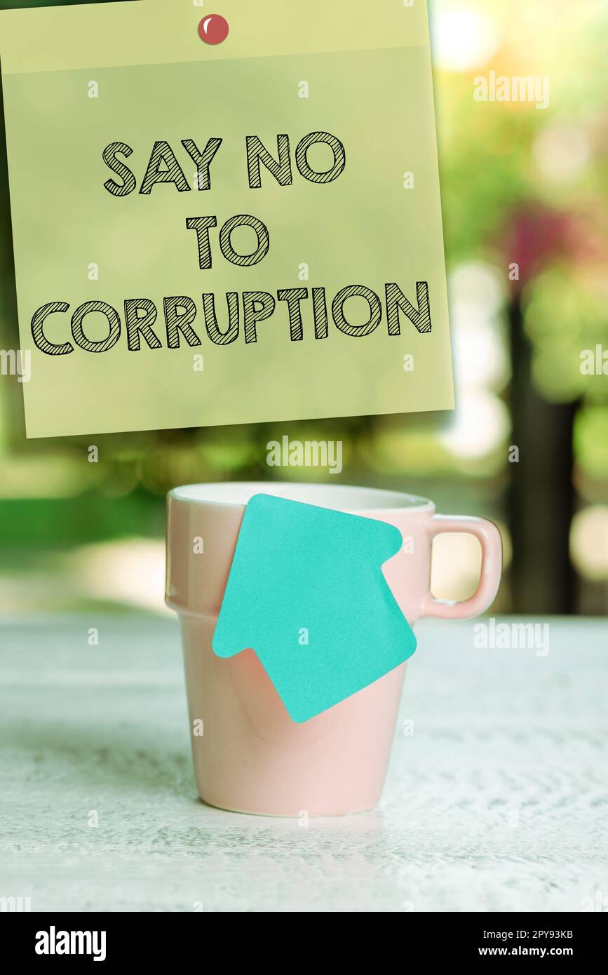 Testo scritto a mano dire No alla corruzione. Parola per l'introduzione di uno scambio di denaro decentrato Foto Stock