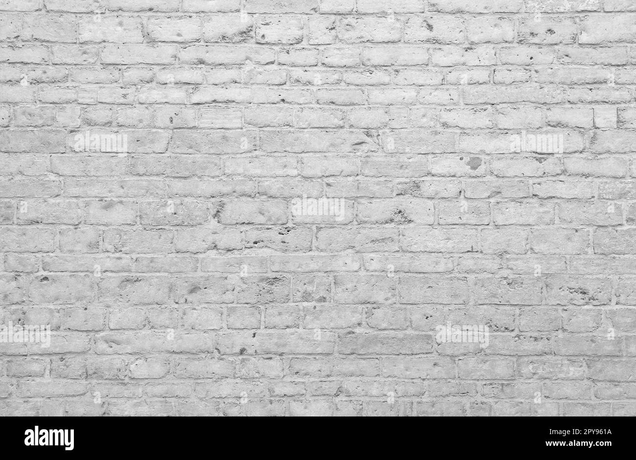 Grunge muro dipinto di bianco sfondo mattoni Foto Stock
