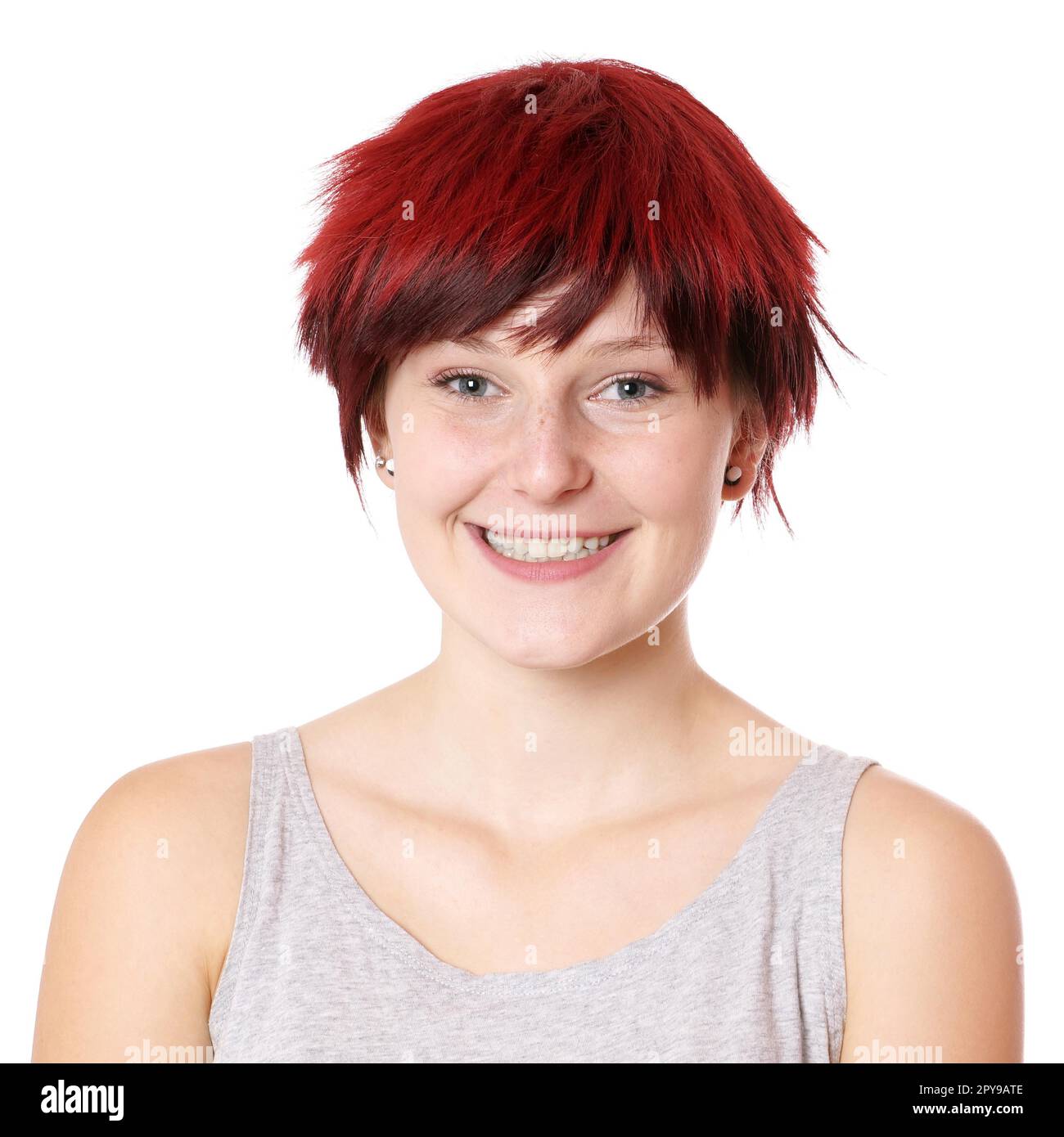 giovane donna sorridente con capelli corti ragazzo taglio Foto Stock