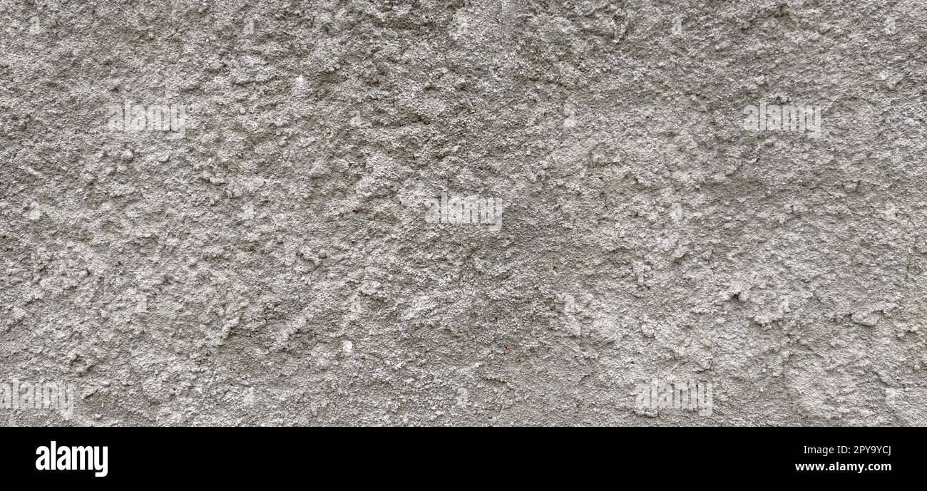 parete bianca e grigia grunge. Struttura in calcestruzzo e gesso Foto Stock