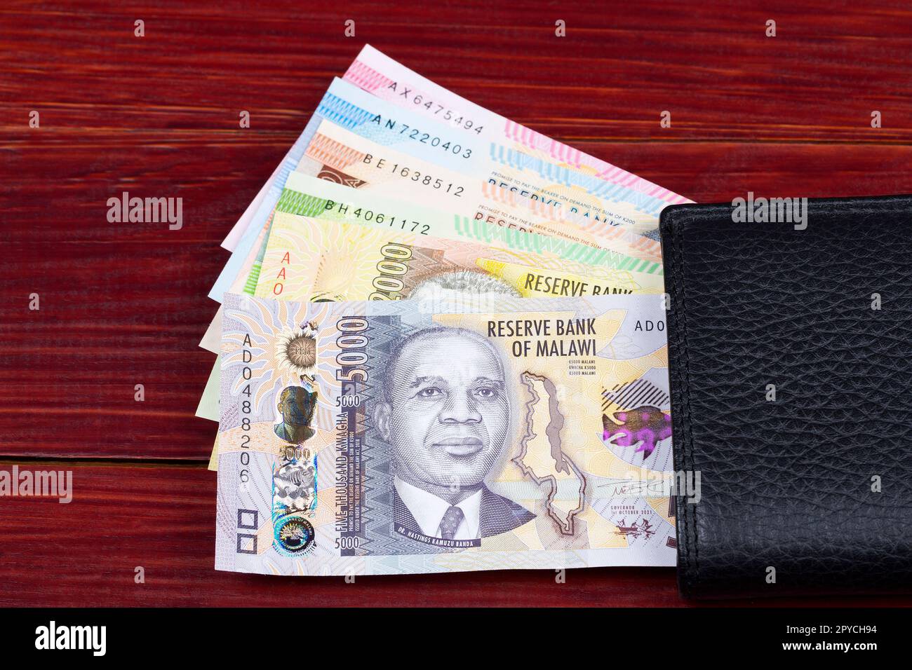 Malawian kwacha nel portafoglio nero Foto Stock