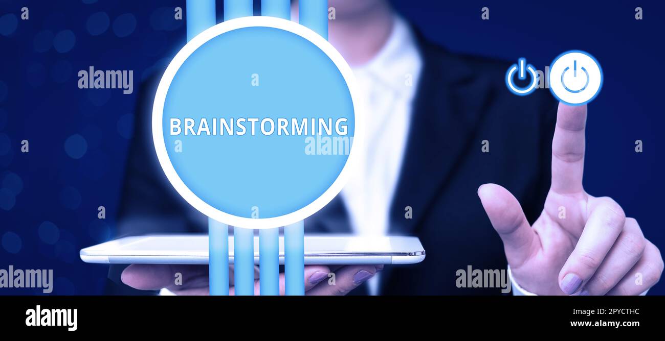 Scrittura con visualizzazione del testo Brainstorming. Business Concept tenere una discussione di gruppo per produrre idee lavoro di squadra Meeting Foto Stock