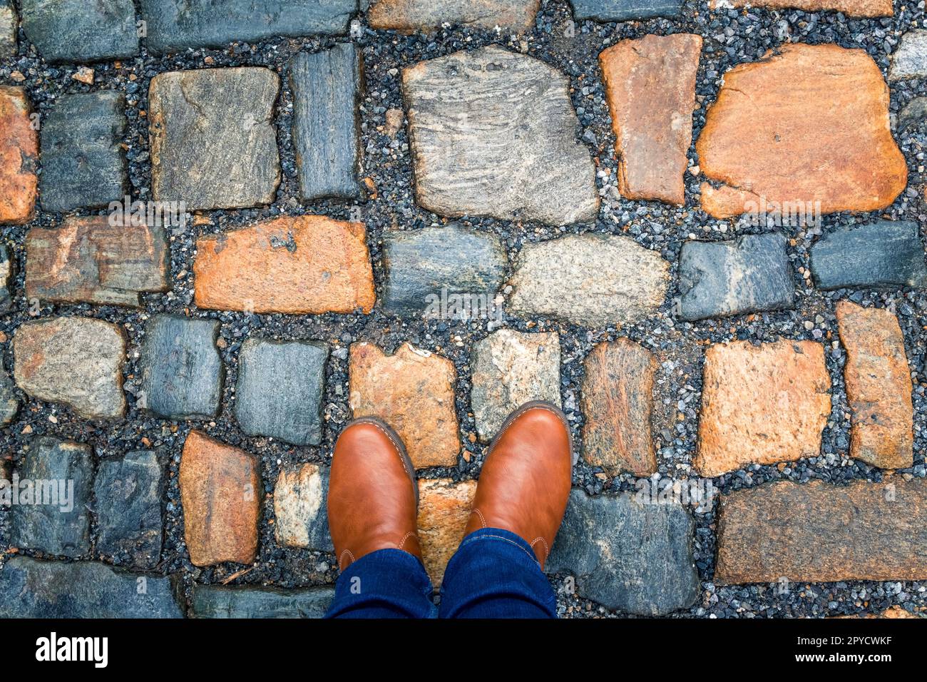 La pavimentazione di granito. Strada lastricata, texture, sfondo Foto Stock