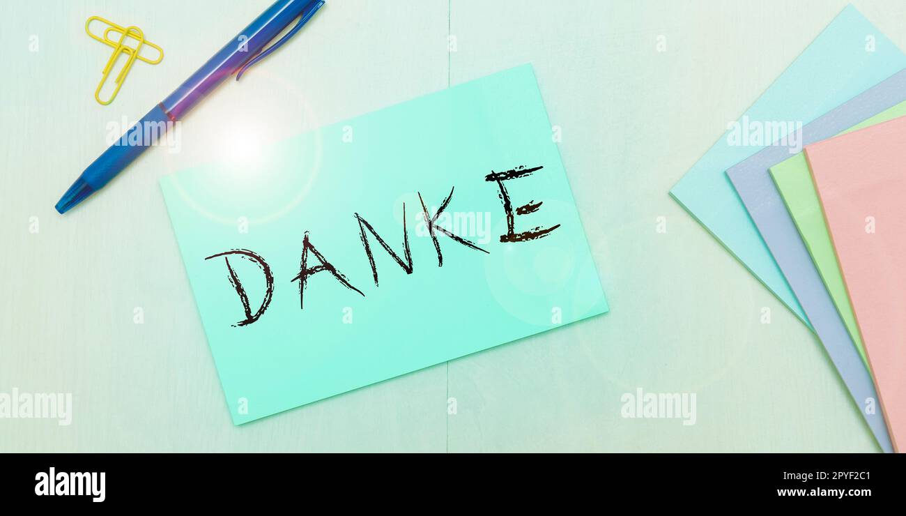 Testo che mostra l'ispirazione Danke. Panoramica aziendale utilizzata come modo informale di dire grazie in lingua tedesca grazie Foto Stock