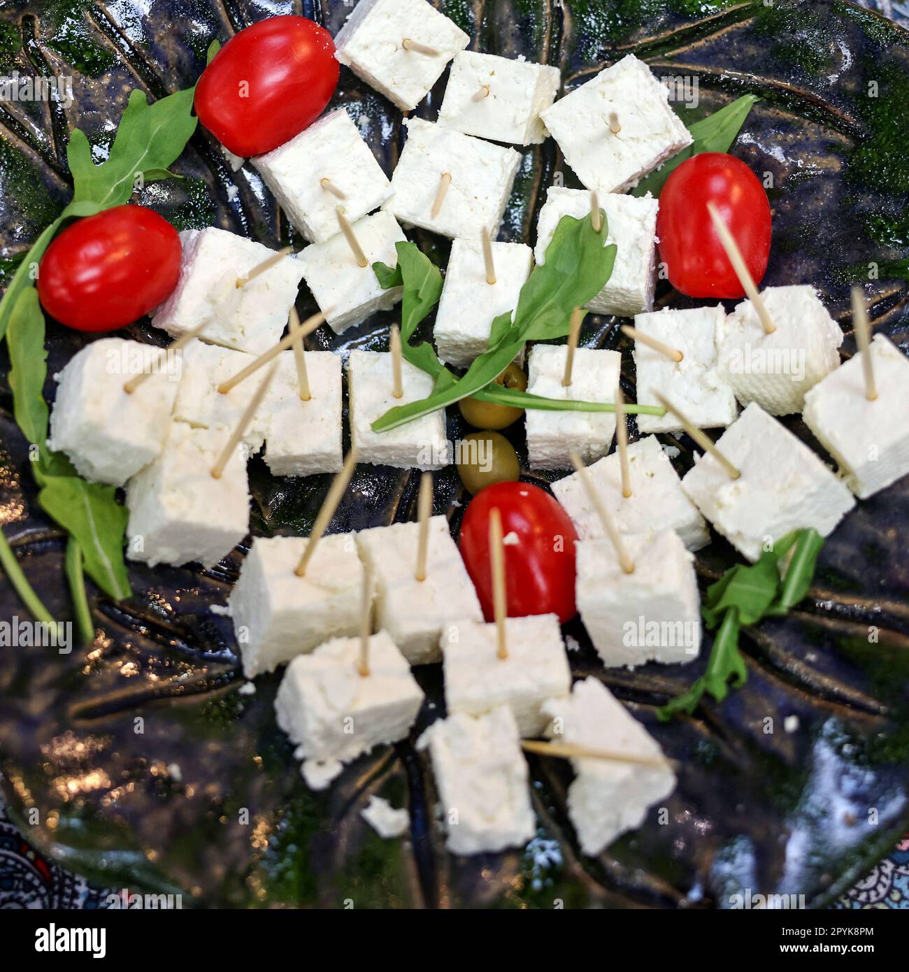 antipasti di formaggio bianco e pomodori ciliegini Foto Stock