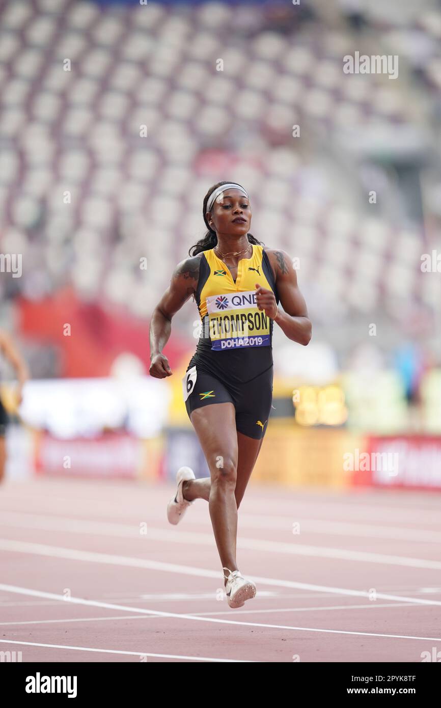 Elaine Thompson-Herah che corre la 100m ai Campionati Mondiali di Atletica 2019 di Doha. Foto Stock