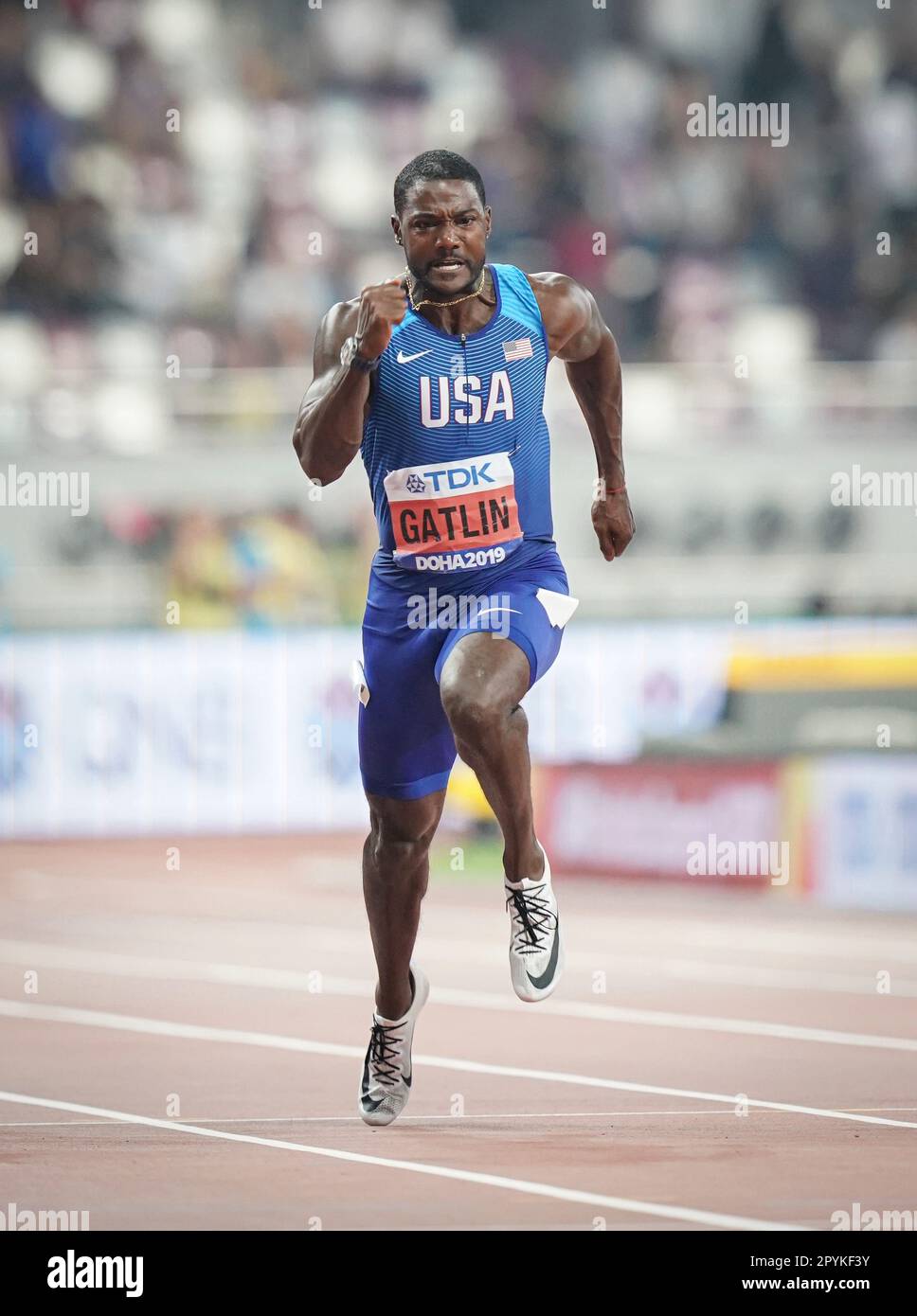 Justin Gatlin che gestisce la 100m ai Campionati Mondiali di Atletica 2019 di Doha. Foto Stock