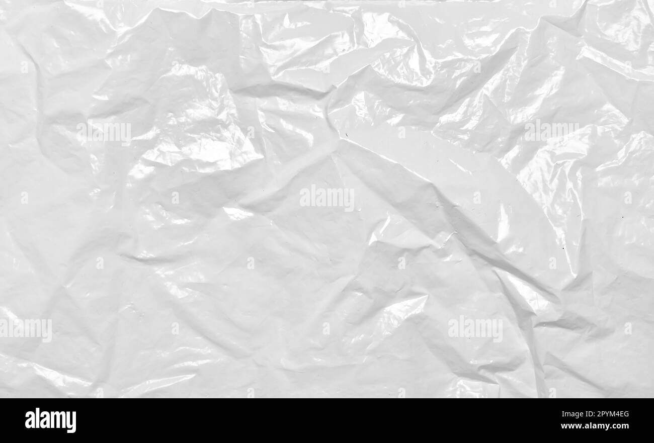 Sacchetto in plastica bianca stropicciata. Sfondo della confezione riciclabile in polipropilene. Sfondo del pacchetto cellophane rugoso. Foto Stock