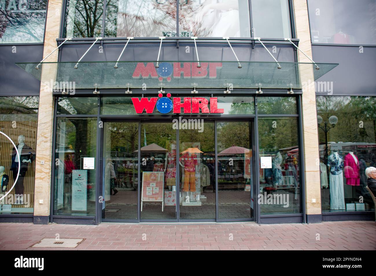 Economia, logo, nome della società, commercio al dettaglio di abbigliamento: Wöhrl scritta della società Foto Stock