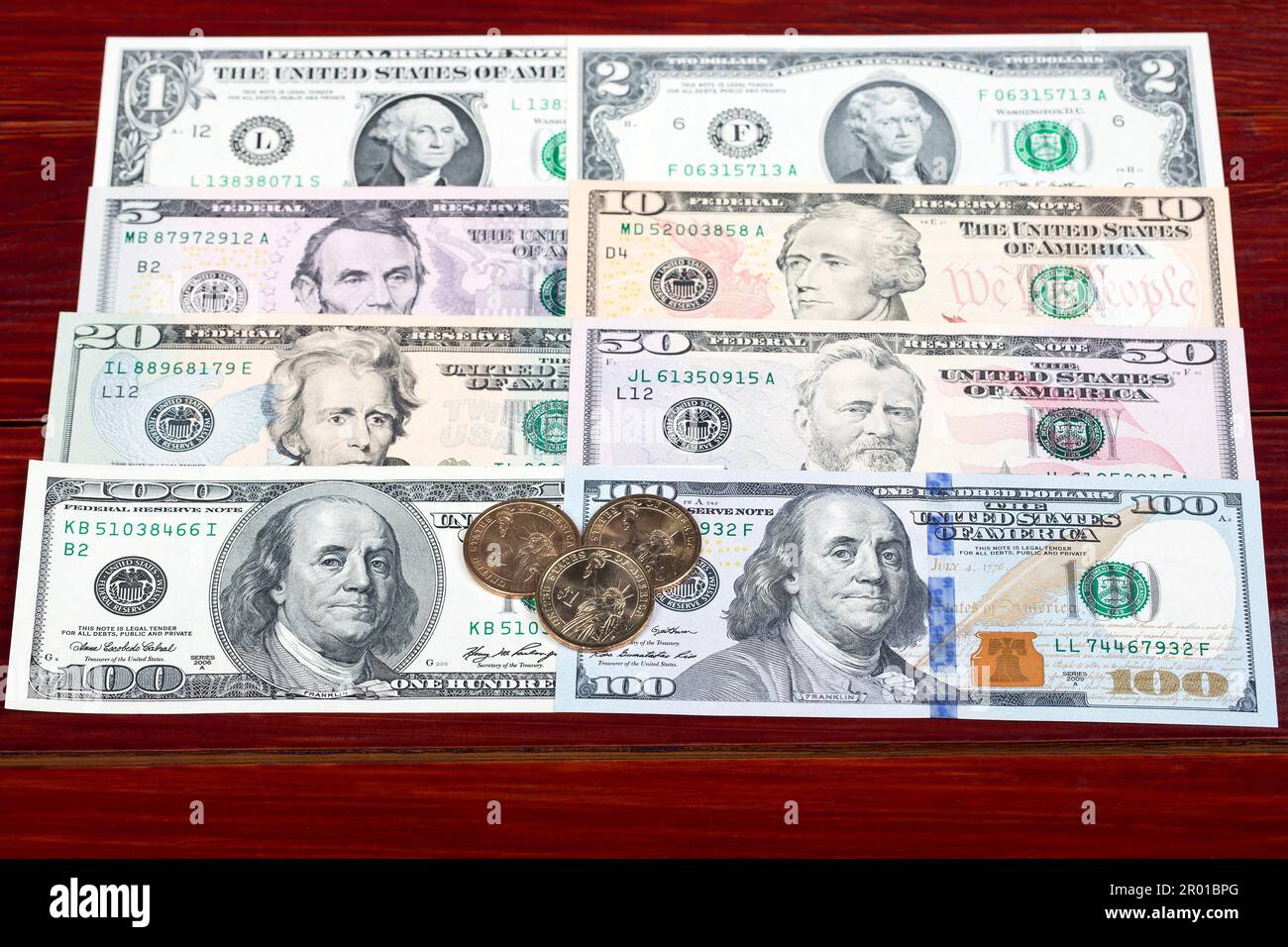 Denaro americano - Dollaro - monete e banconote Foto Stock