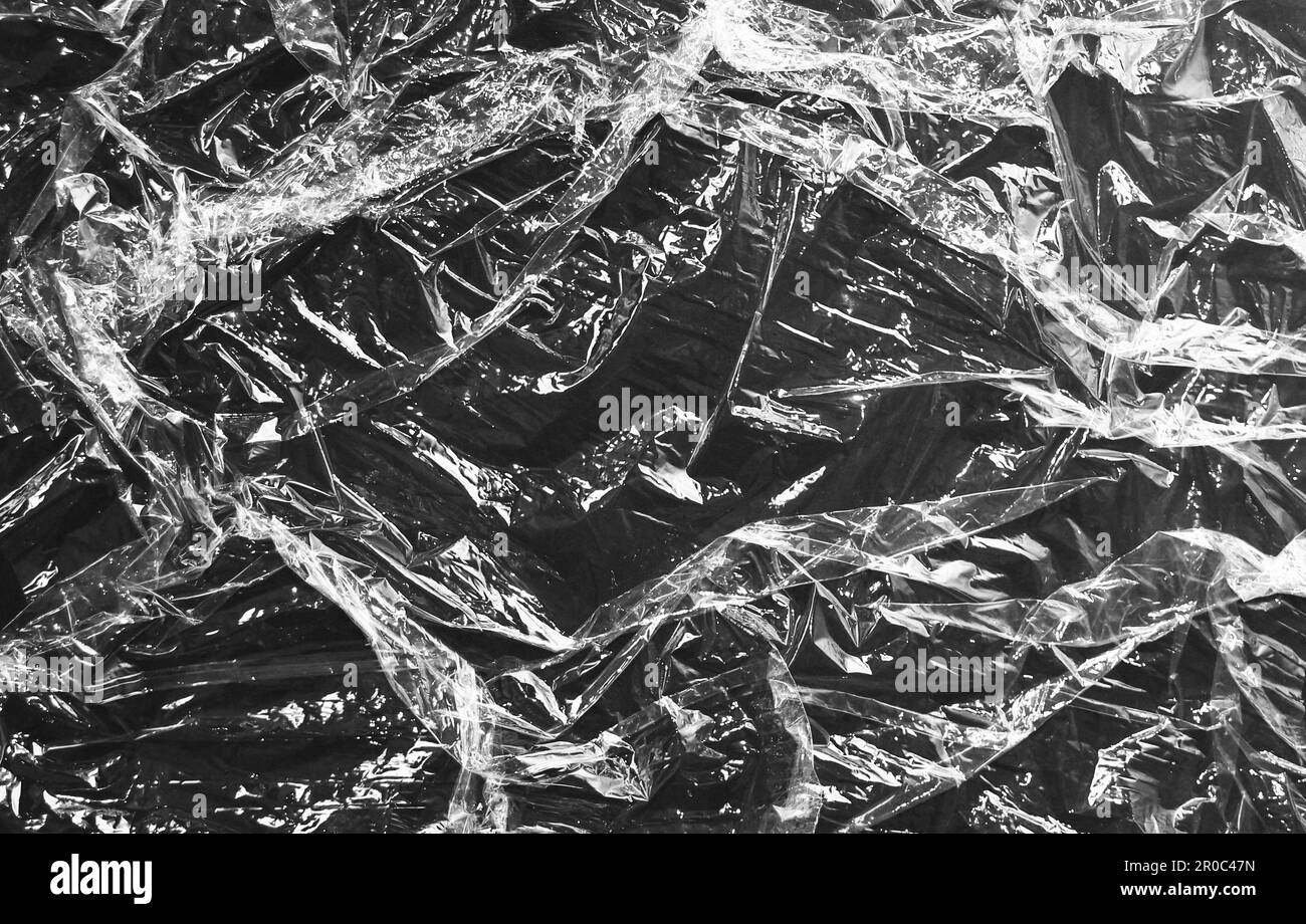 Struttura in plastica trasparente in polietilene stropicciato. Coprire l'imballaggio con pellicola estensibile Foto Stock