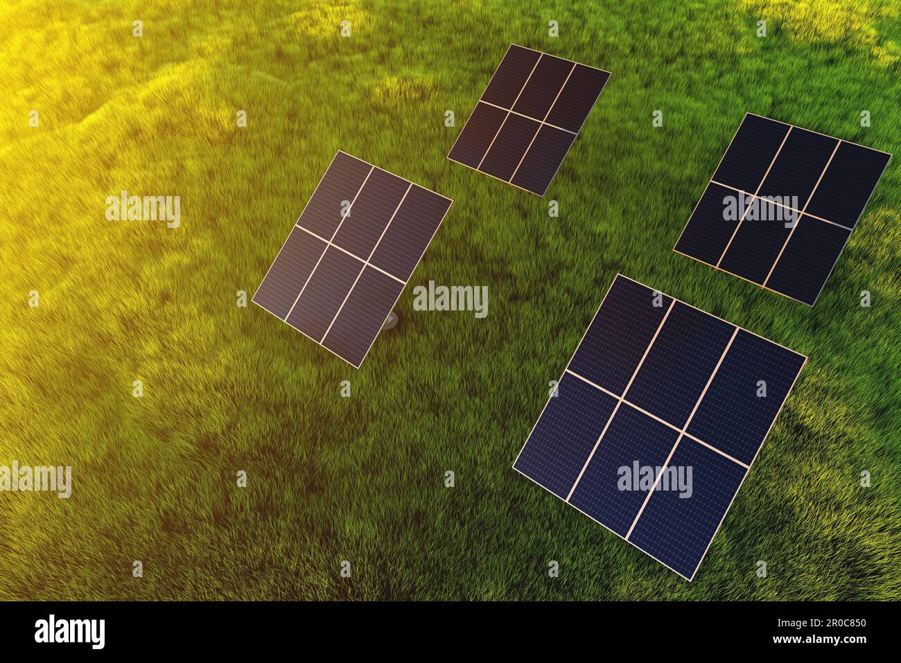 Moduli pannelli solari al tramonto in un campo su uno sfondo di erba verde. Impianto di alimentazione a terra di energia elettrica alternativa Foto Stock