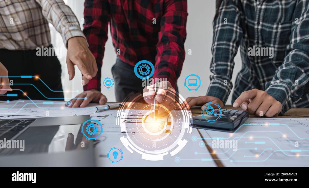 Building Information Modeling Technology Concept, team di ingegneri che lavorano sulla scrivania dell'ufficio con l'icona sullo schermo vr, Industry Construction, Architect Foto Stock
