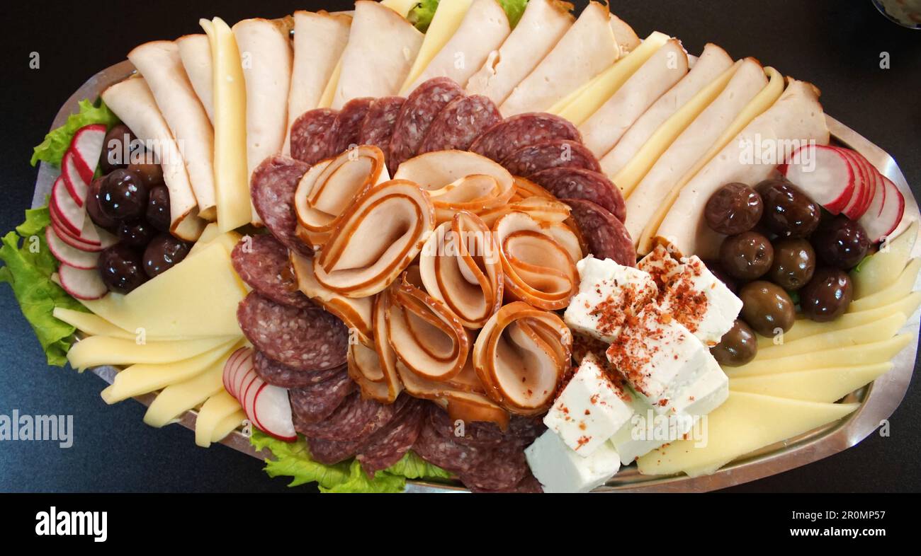 Piatto di carni miste e formaggi. Foto Stock