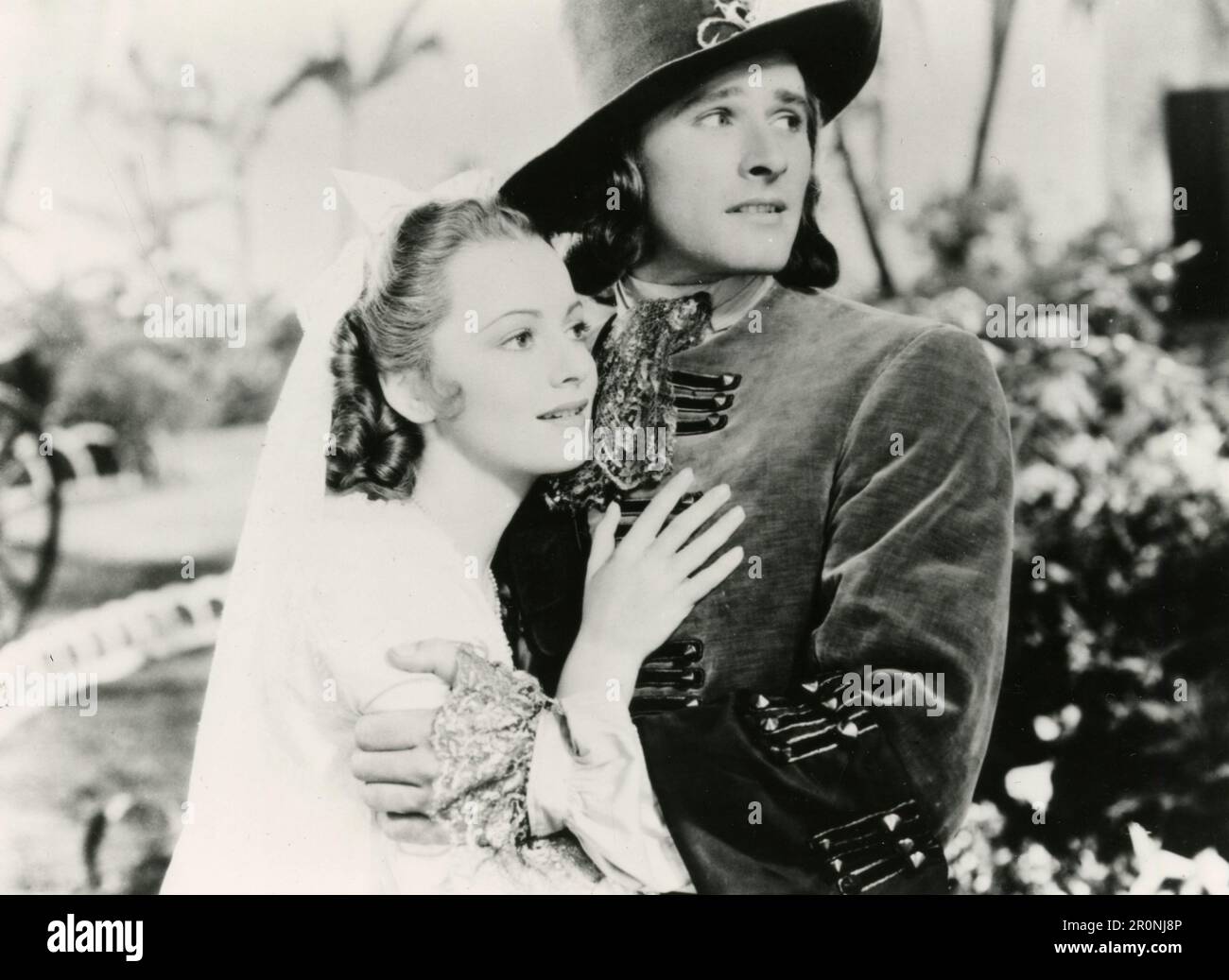L'attrice Olivia de Havilland e l'attore Errol Flynn nel film Captain Blood, USA 1935 Foto Stock