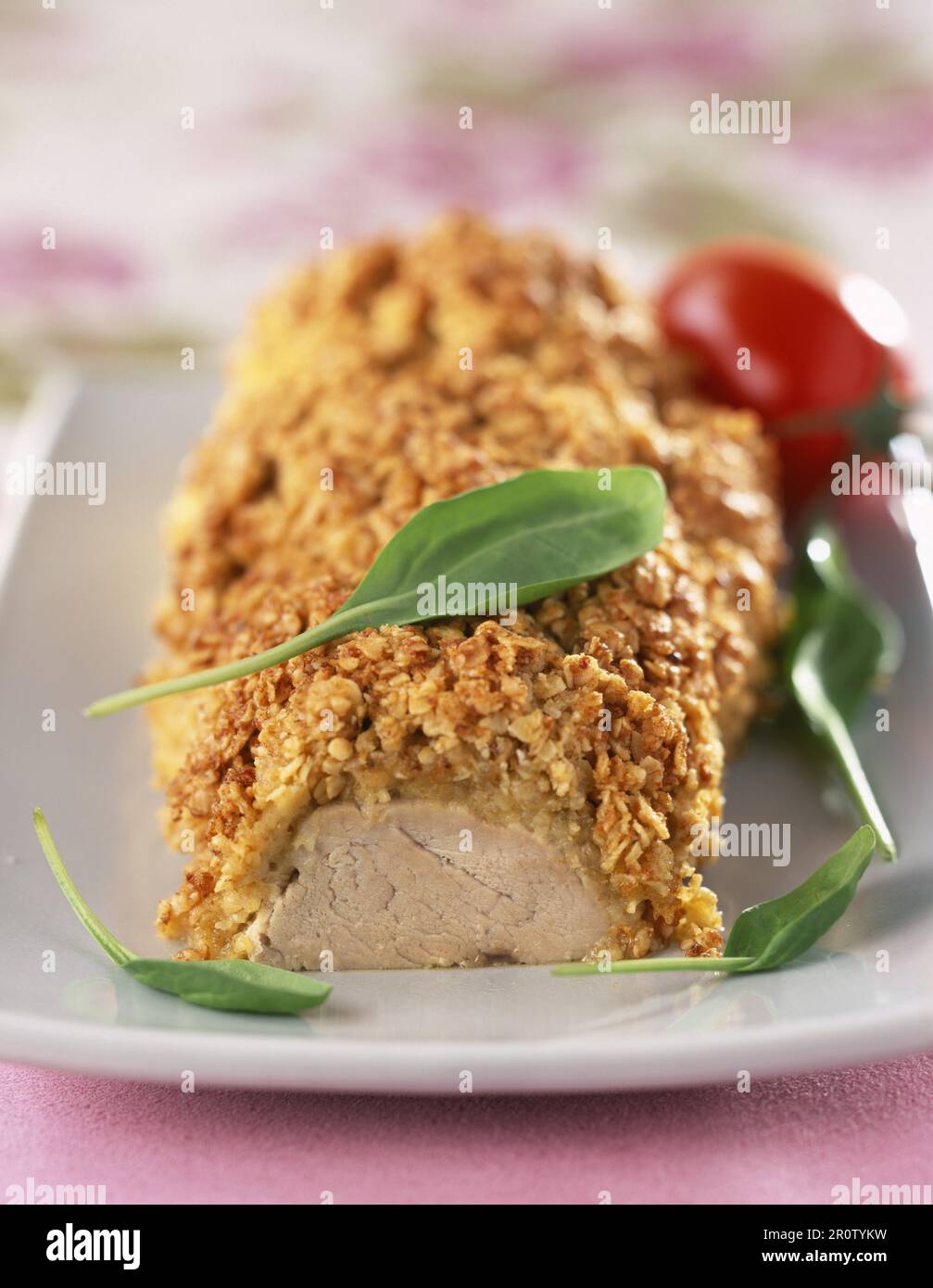 Filetto di maiale mignon in crosta di avena Foto Stock