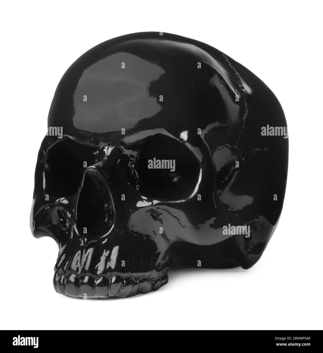 Cranio umano lucido nero isolato su bianco Foto Stock