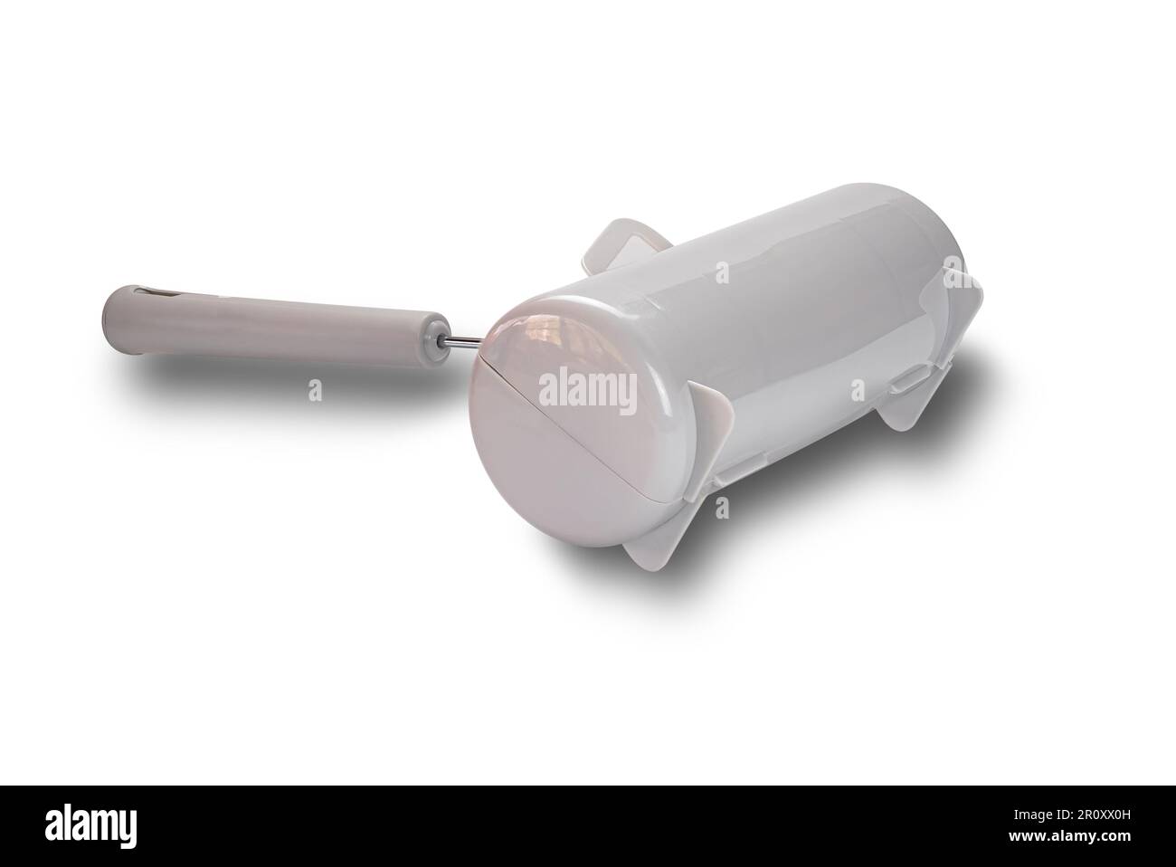 Vista del dispositivo a rullo per la rimozione di polvere, capelli e altri corpi estranei appiccicosi isolato su sfondo bianco con percorso di ritaglio. Foto Stock