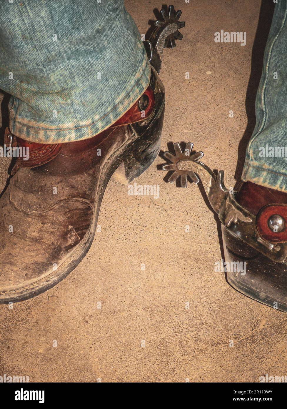 Gli spurs del bagagliaio sono attrezzi essenziali per i cowboy di funzionamento in Texas Foto Stock