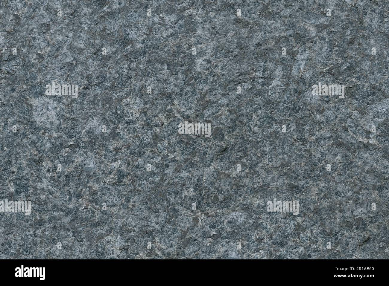 sfondo in granito grigio naturale tagliato in pietra Foto Stock