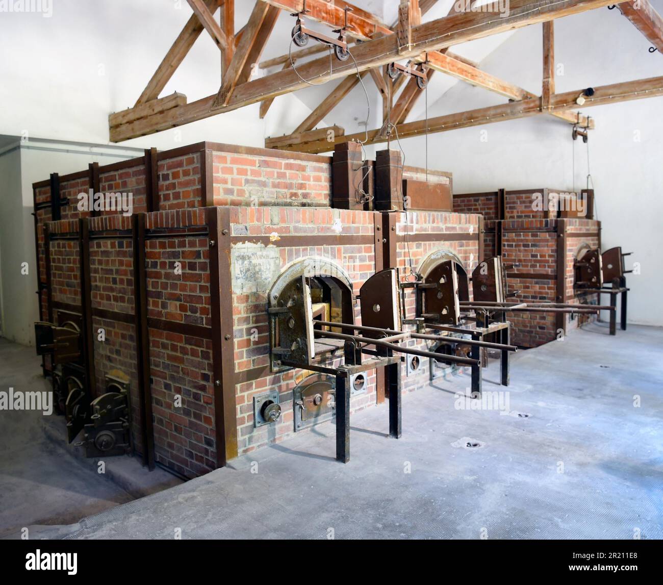 Fotografia dei forni di cremazione al campo di concentramento di Dachau. Il campo fu il primo dei campi di concentramento nazisti che aprirono nel 1933. L'intenzione iniziale per il campo era quella di tenere prigionieri politici. Foto Stock