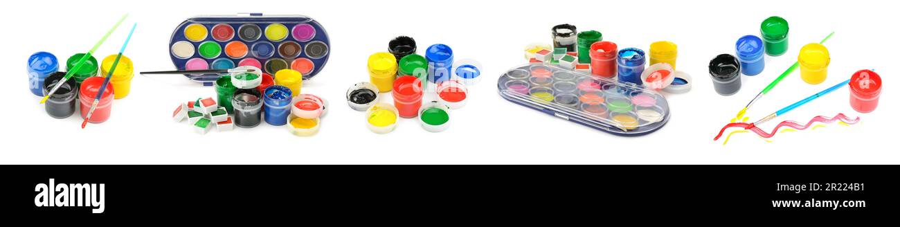Pitture e pennelli multicolore ad acquerello e gouache isolati su sfondo bianco. Foto Stock