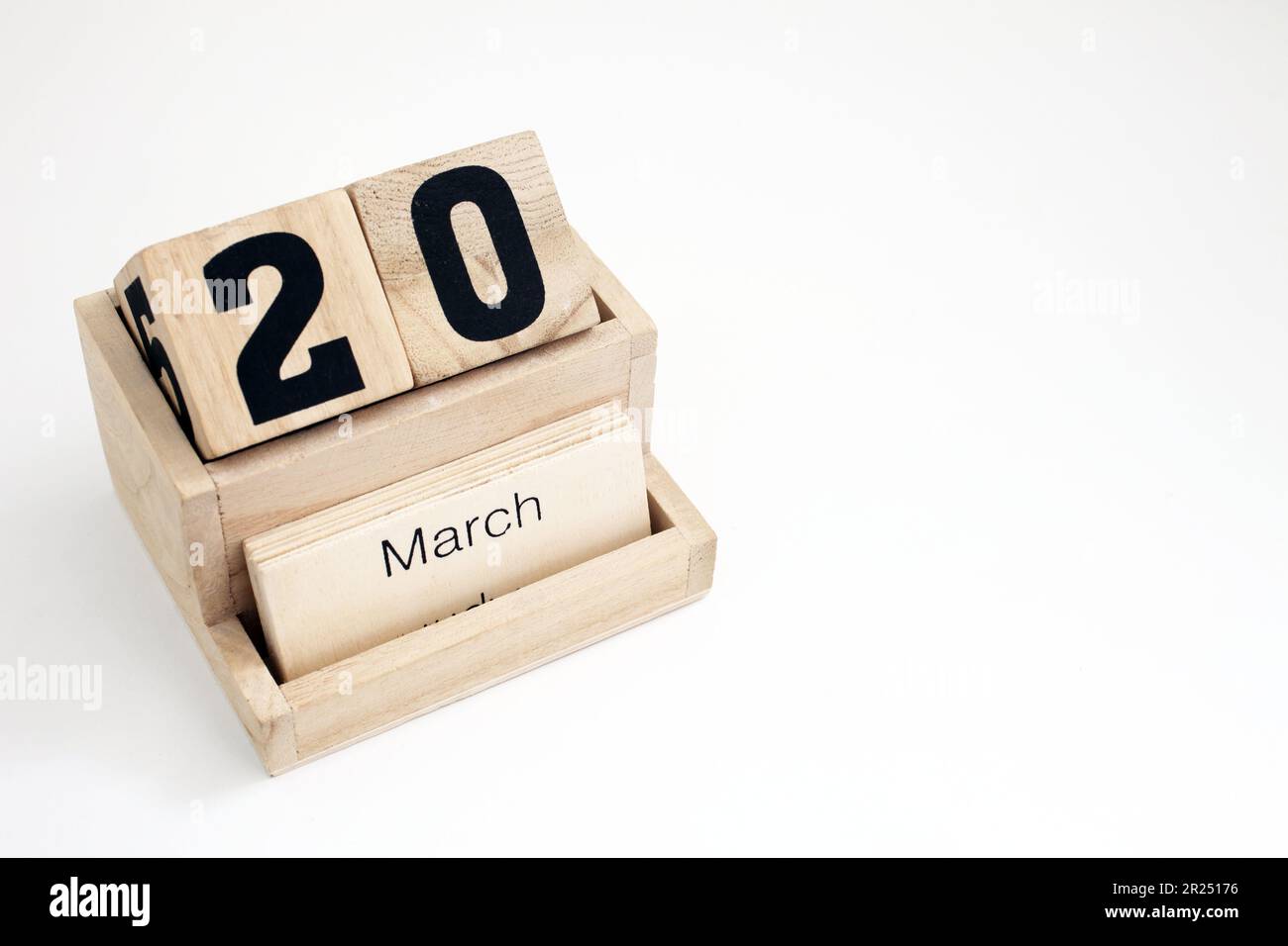 Calendario perpetuo in legno che mostra il 20th marzo Foto Stock