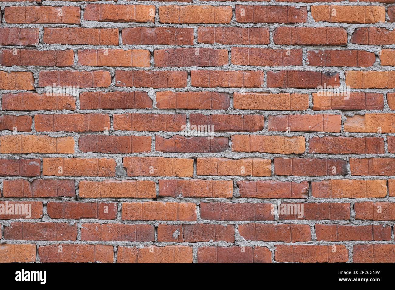 Immagine full frame di un muro di mattoni rossi. Foto Stock