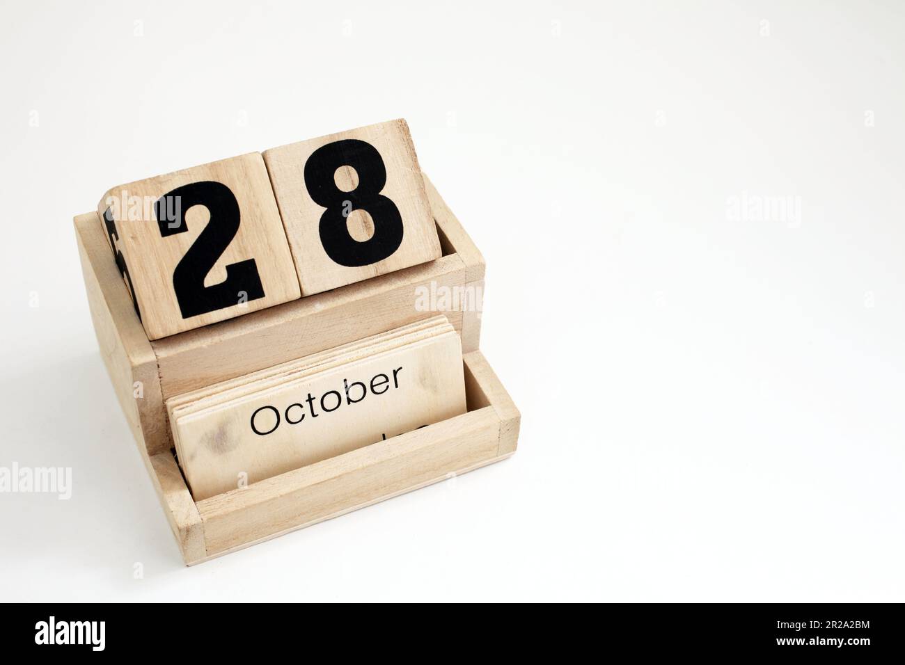 Calendario perpetuo in legno che mostra il 28th ottobre Foto Stock