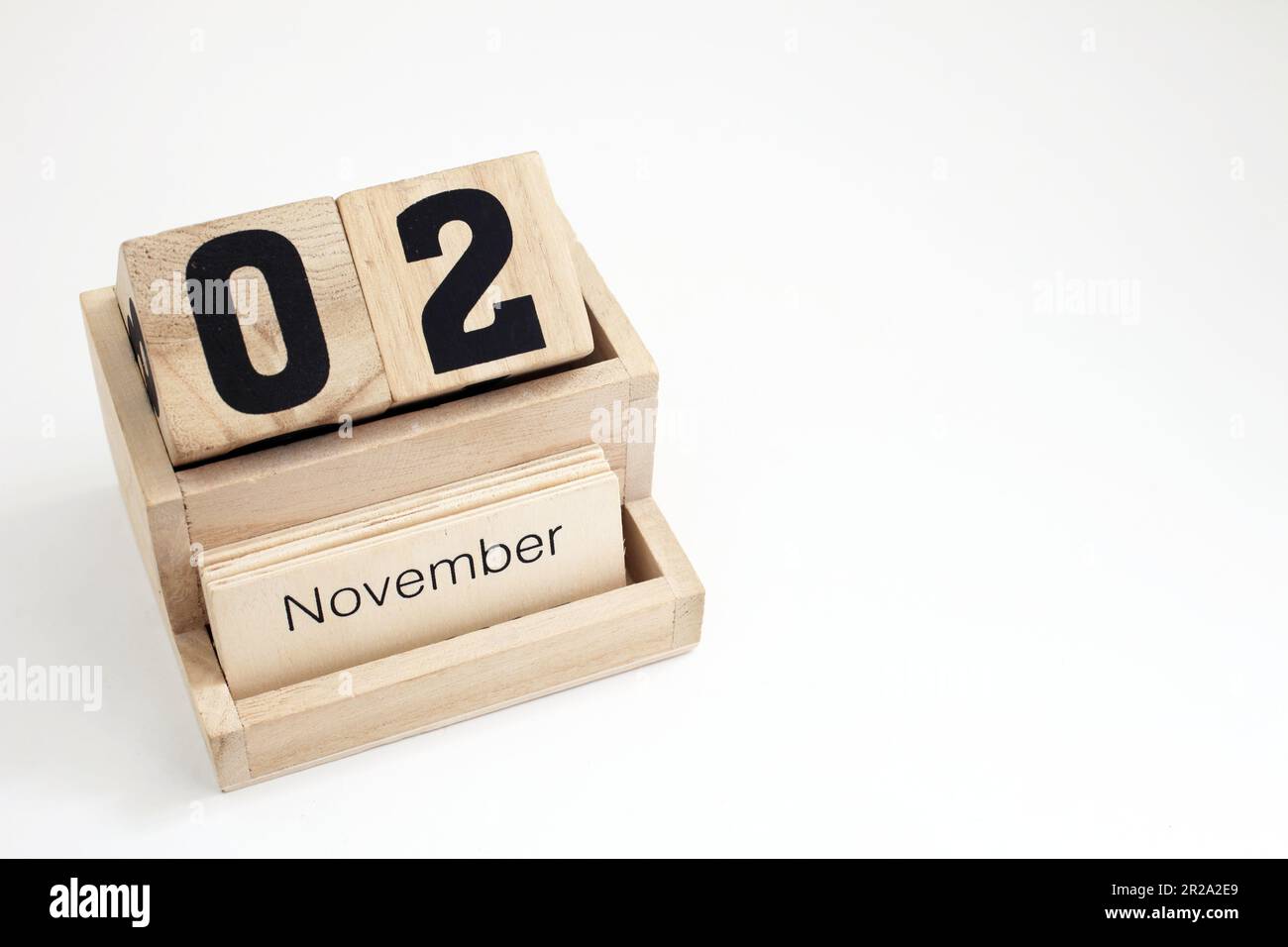 Calendario perpetuo di legno che mostra il 2nd novembre Foto Stock