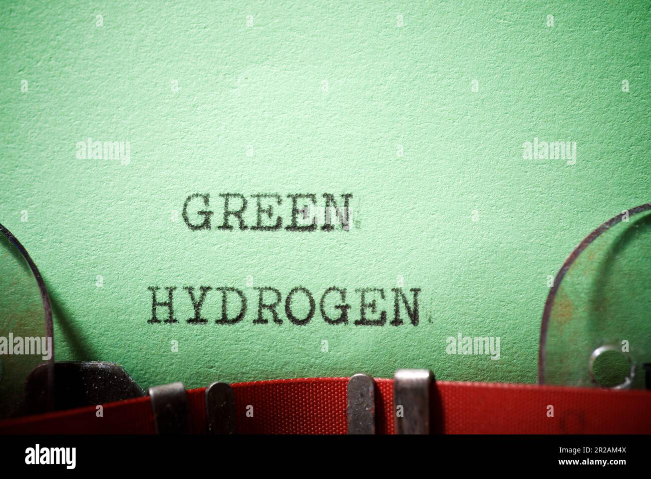 Testo verde a idrogeno scritto con una macchina da scrivere. Foto Stock