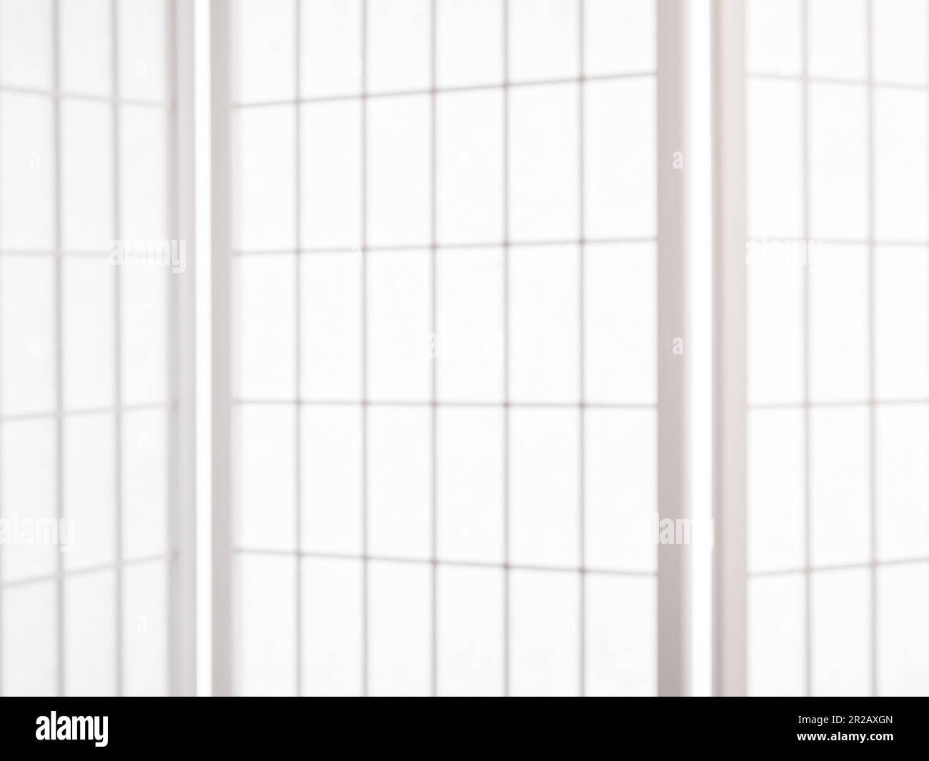 sfondo con messa a fuoco morbida - dettaglio dello schermo divisorio orientale della stanza in carta di riso bianca shoji Foto Stock