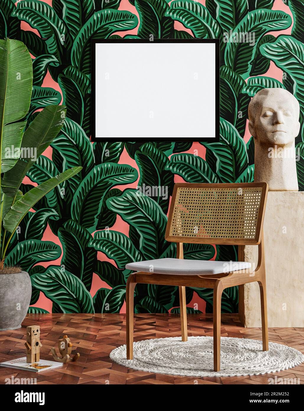 Cornice foto vuota mockup appeso su uno sfondo parete tropicale Foto Stock
