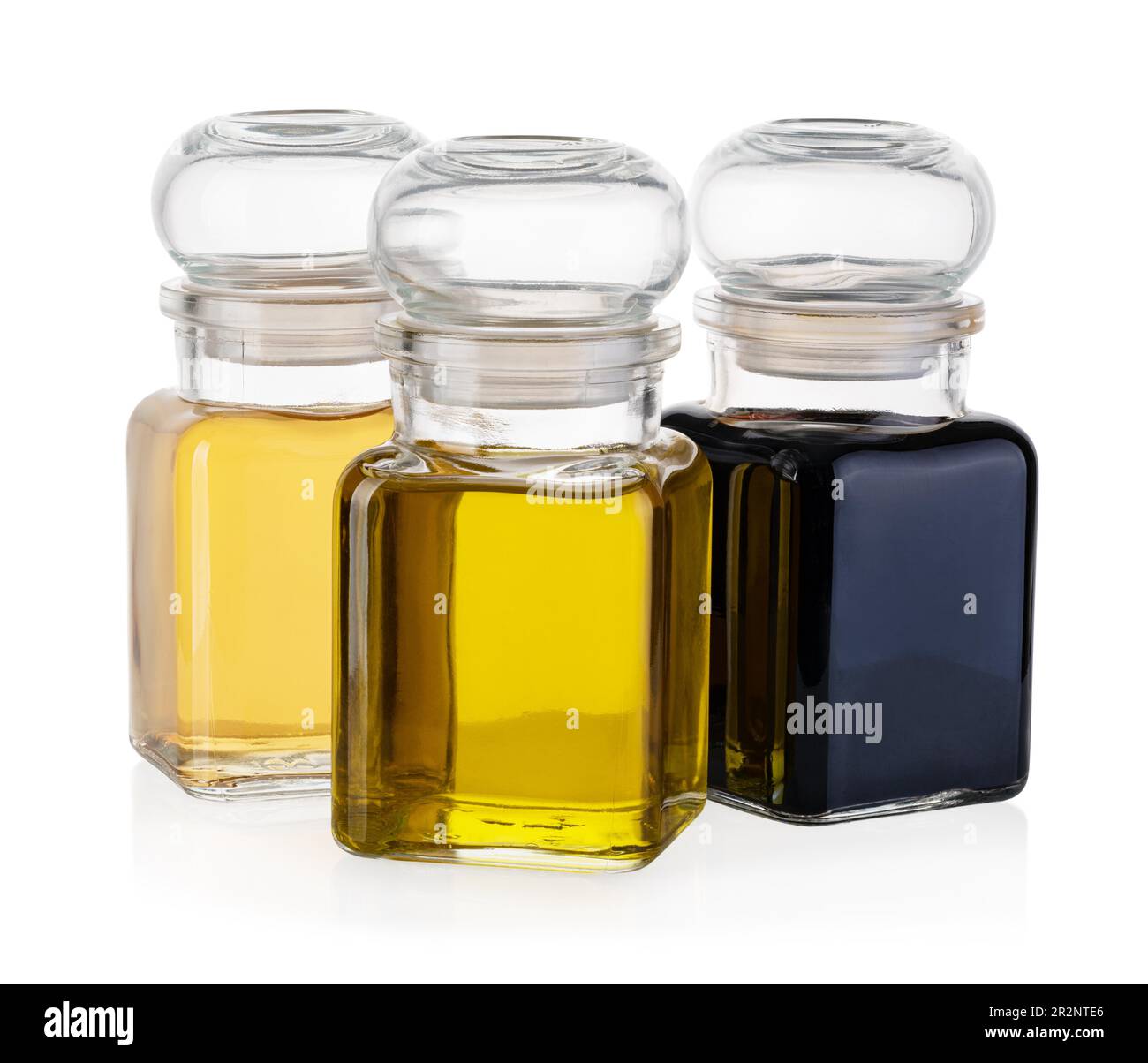 Bottiglia di olio di oliva e aceto isolati su sfondo bianco Foto Stock