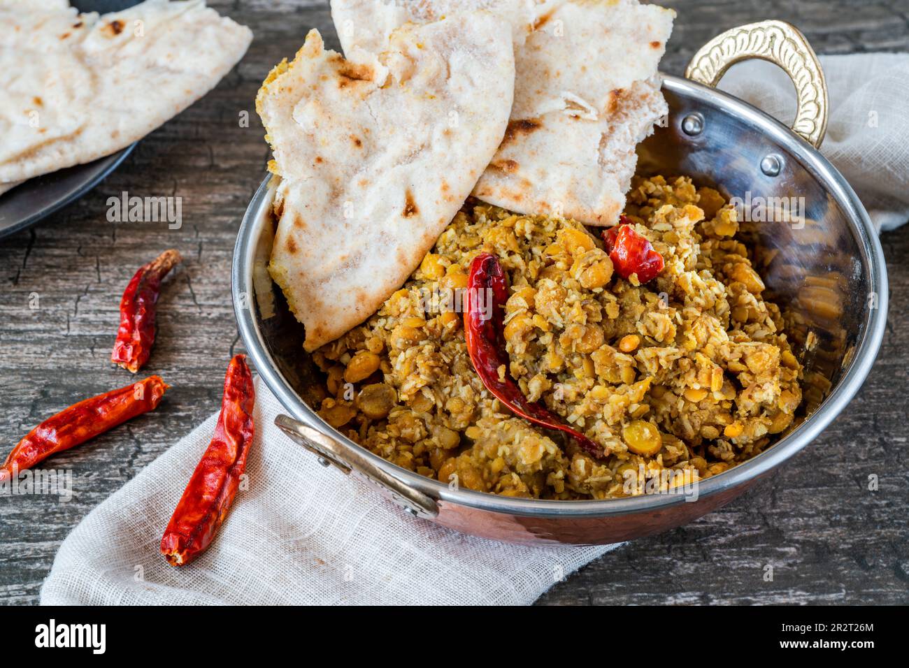 Curry al cocco bengala con roti Foto Stock