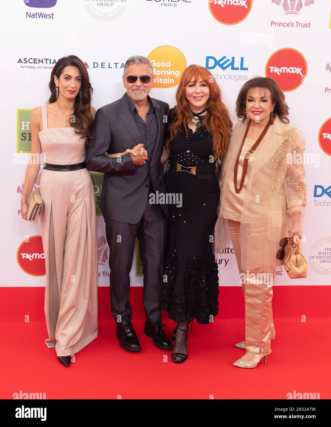 Londra, Regno Unito. 16 maggio, 2023. (L-R) Charlotte Tilbury, Amal Clooney, George Clooney e Baria Alamuddin partecipano al Prince's Trust e ai TK Maxx & Homesense Awards, Theatre Royal, Drury Lane, Londra, Inghilterra. Credit: S.A.M./Alamy Live News Foto Stock