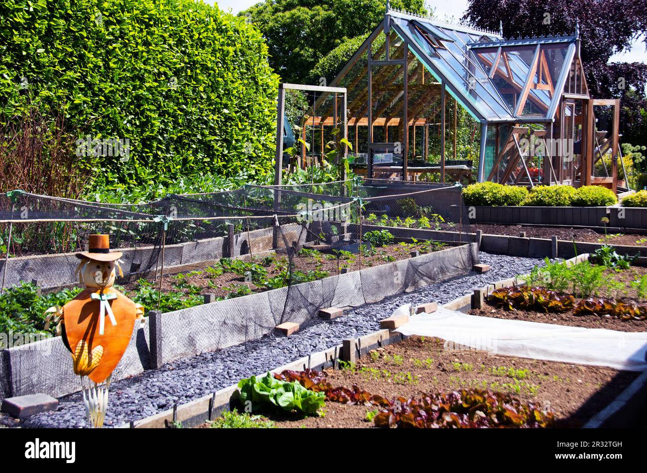 Orto in un giardino del villaggio aperto per beneficenza Foto Stock