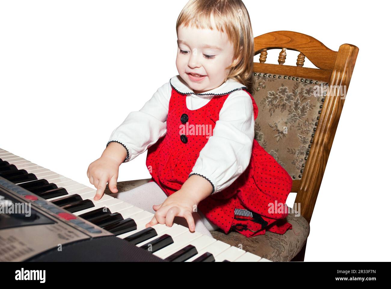 Bambina suona al pianoforte Foto Stock