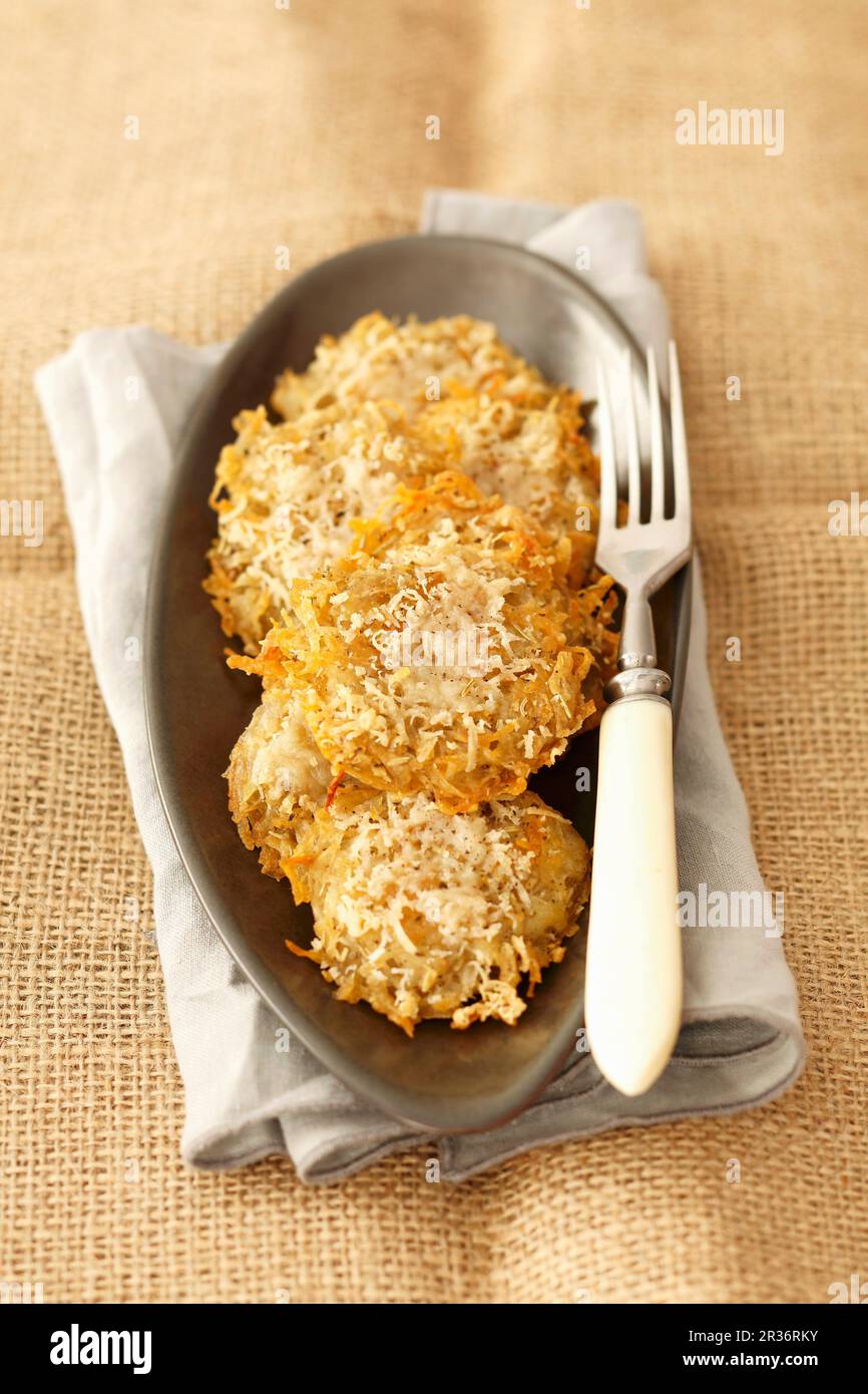 Frittelle di patate con parmigiano Foto Stock